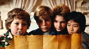 The Goonies looking at the treasure map